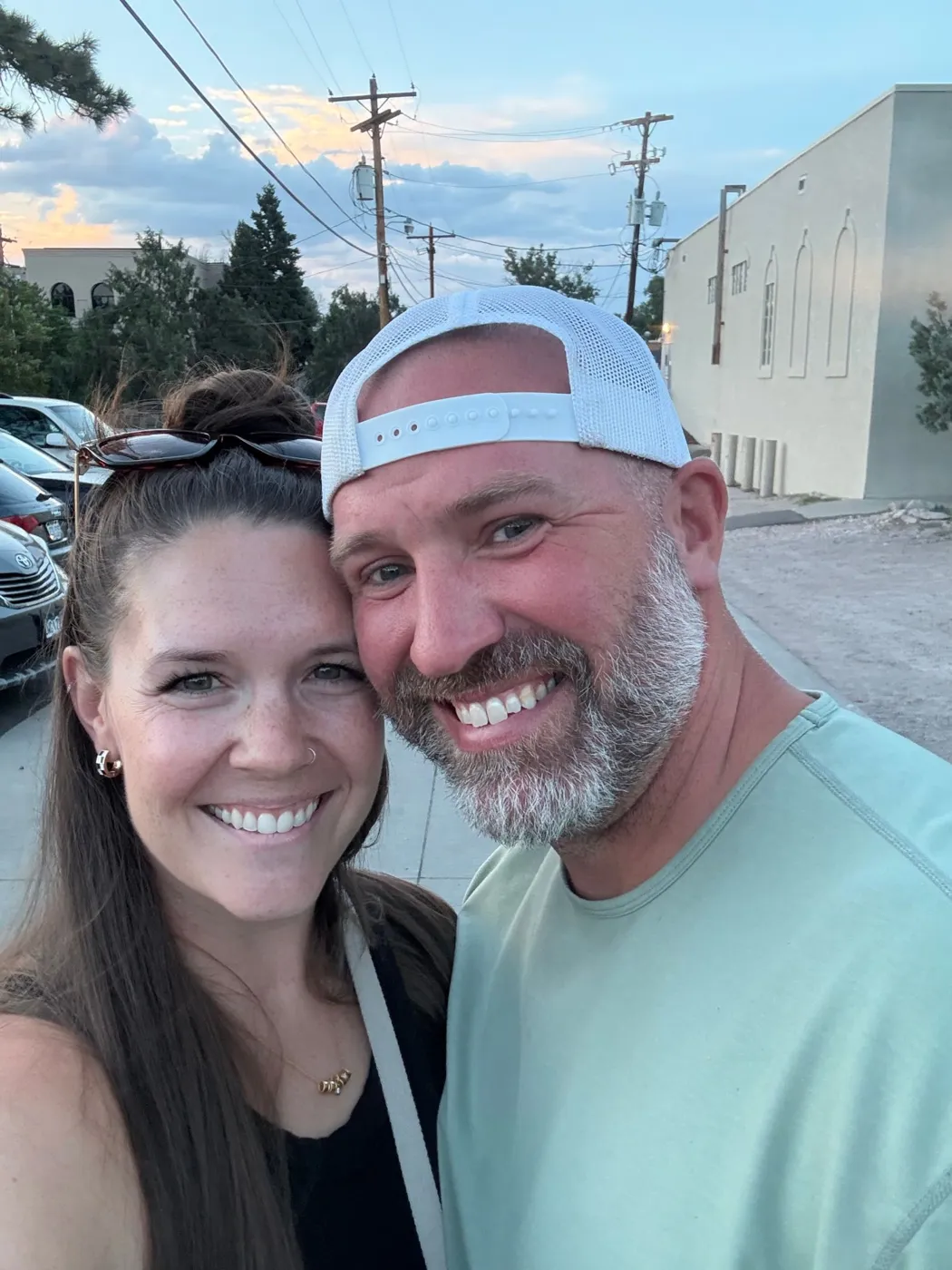 Alyssa and Michael smiling together outside